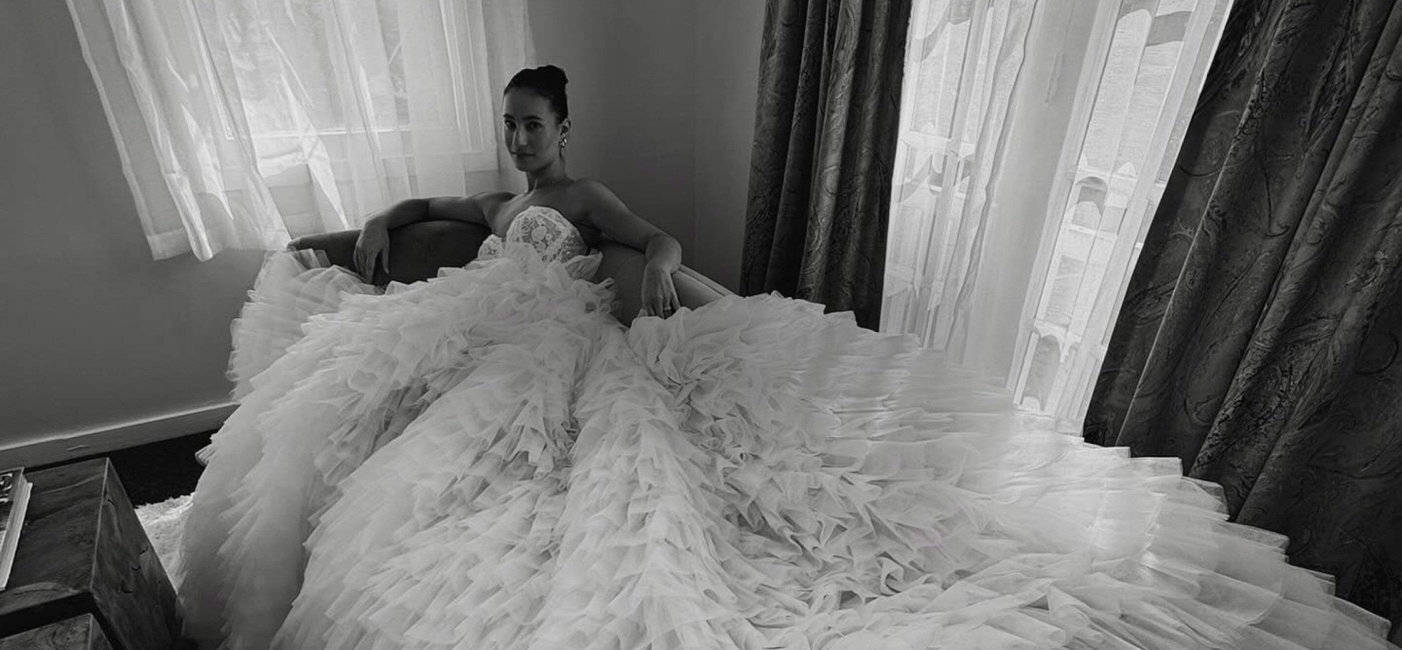 Photo of the model posing on the sofa